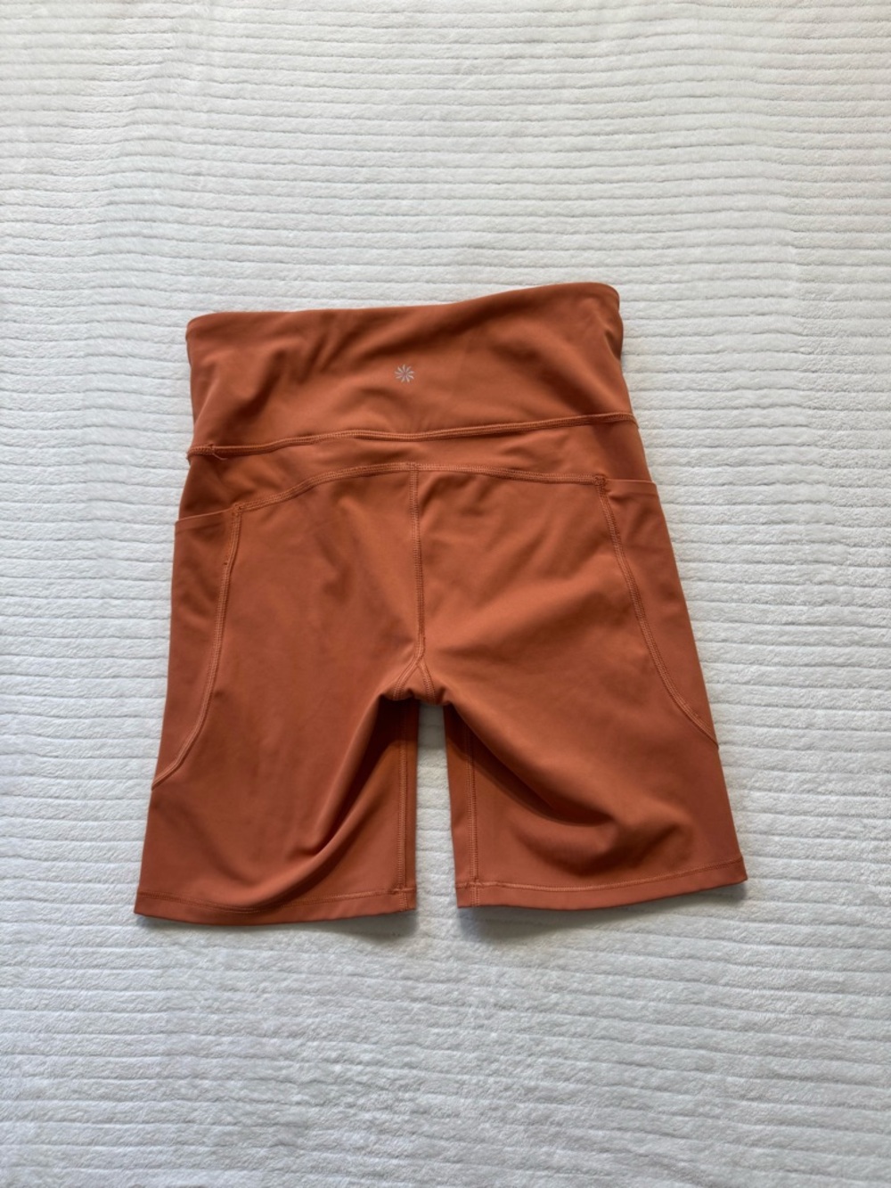 Athleta Burnt Orange High-Rise Bike Shorts with Pockets